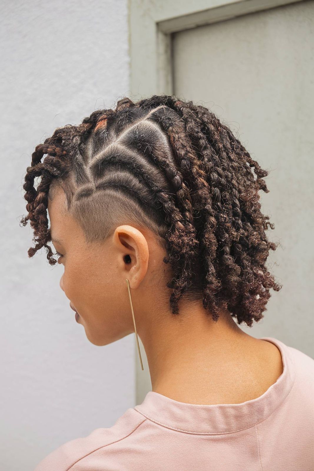 Dark Brown Coily Bob with Geometric Undercut — Undercut Hairstyles for Women