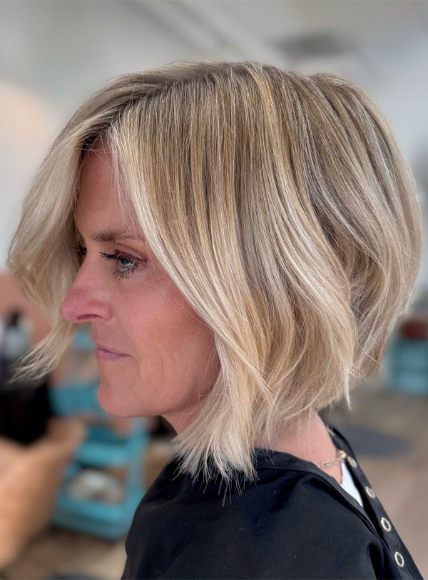 Layered Ash Blonde Bob with Highlights Layered Ash Blonde Bob with Highlights — Blonde Hair Over 50