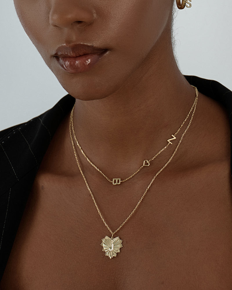 Layered Necklaces with Initials and Hearts on Black Blazer Layered Necklaces with Initials and Hearts on Black Blazer — Initial Necklaces