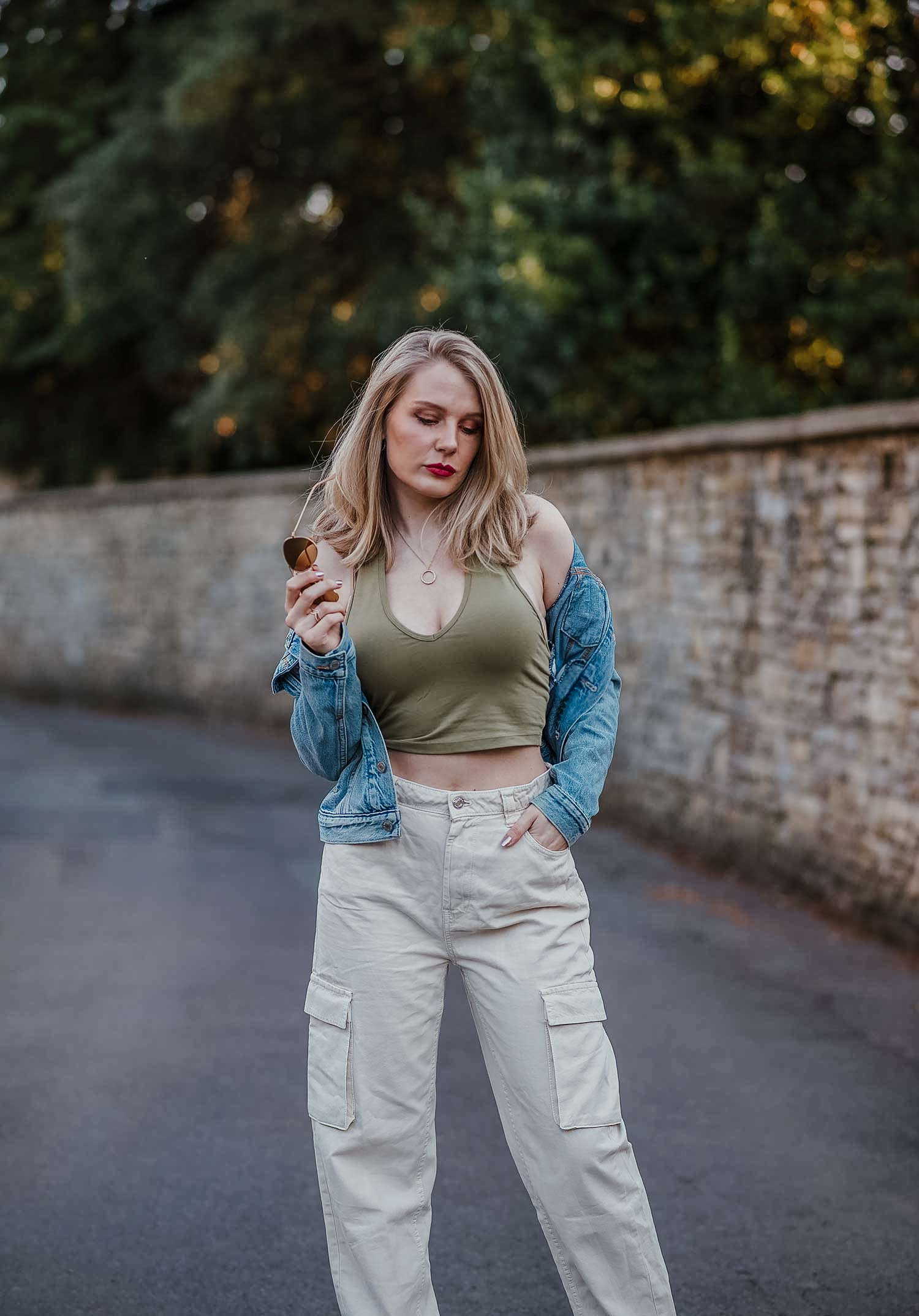 Cream Cargo Pants With Halter Top and Denim Jacket — Cargo Pants Outfits
