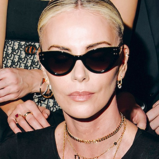 Layered Accessories: Cat-Eye Sunglasses with Multiple Necklaces — Sunglasses for Oval Face