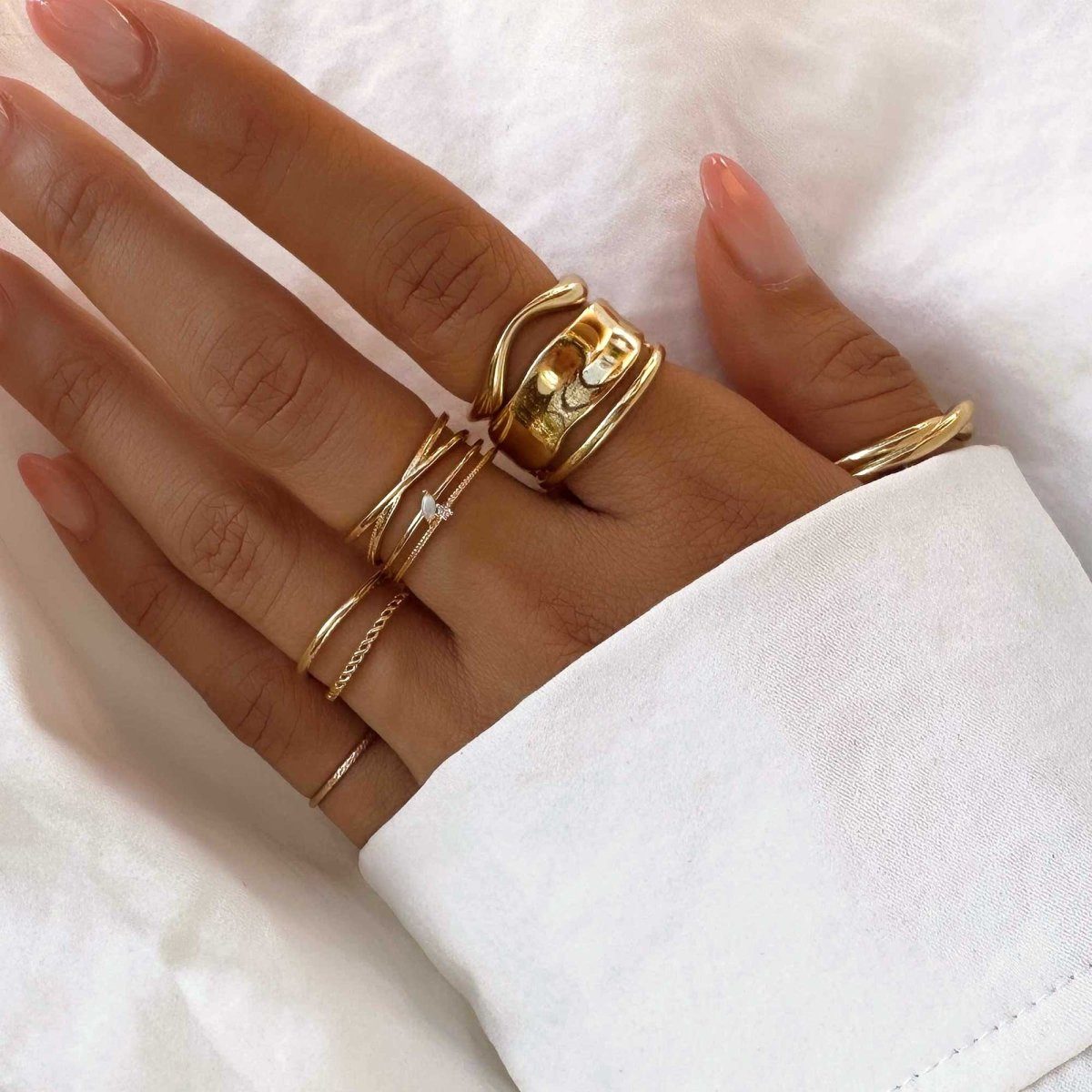 Wave and Diamond Rings Paired with a White Shirt Wave and Diamond Rings Paired with a White Shirt — Gold Ring Stack