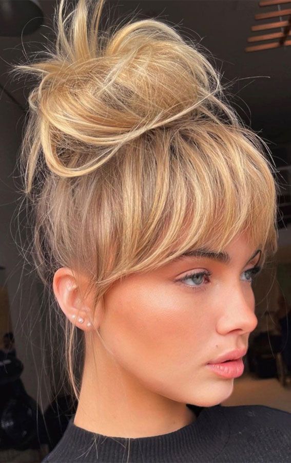 Messy Top Knot With Blunt Bangs Messy Top Knot With Blunt Bangs