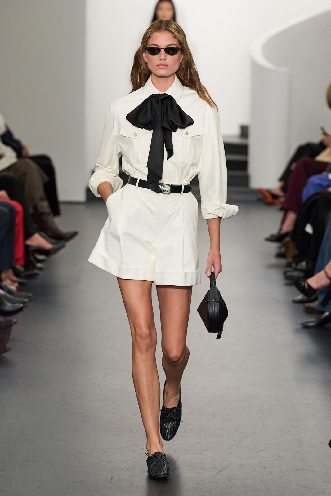 Fashion Show Ready: White Shorts, Bow Detail, and Oval Sunglasses — Oval Sunglasses Outfits