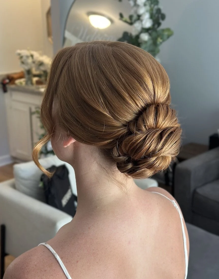 Auburn Low Bun With Intricate Braid Auburn Low Bun With Intricate Braid — Updos for Long Hair