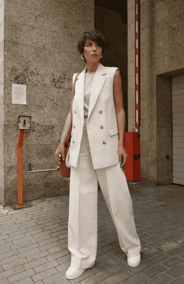 Cream Sleeveless Vest and Wide-Leg Trousers with Sneakers — First Day of Work Outfits