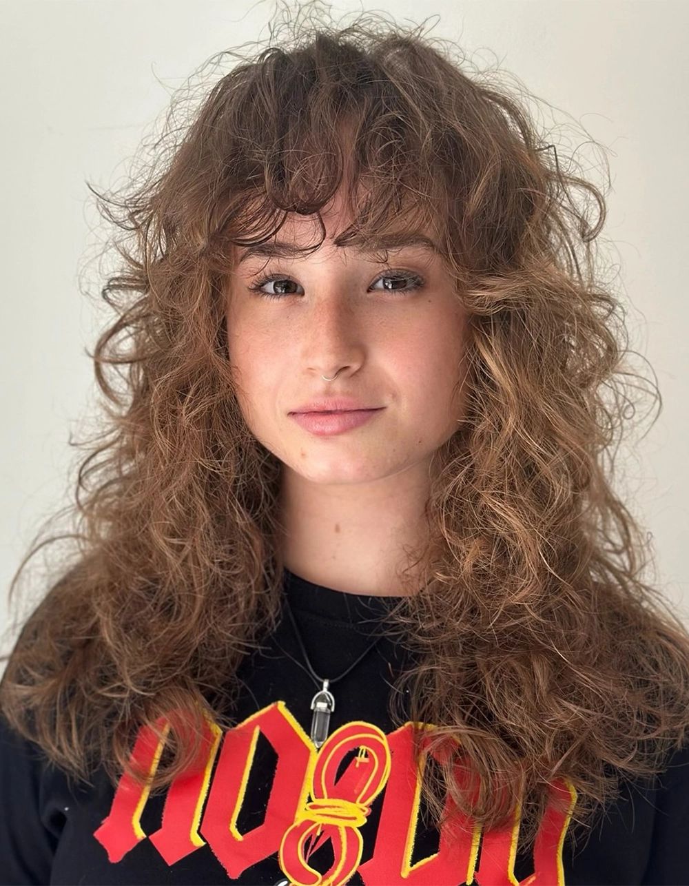Mid-Back Brown with Wispy Bangs — Curly Wolf Cut