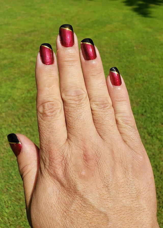 Deep Red Shimmer with Black and Gold Line Deep Red Shimmer with Black and Gold Line — Two Tone Nails