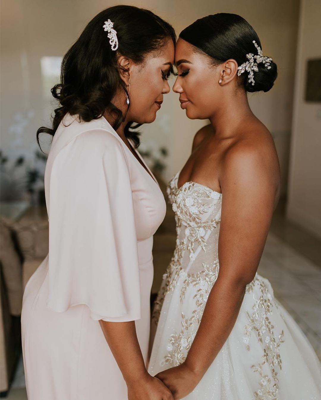 Sleek Dark Brown Low Bun With Side Part Sleek Dark Brown Low Bun With Side Part — Mother of the Bride Hairstyles