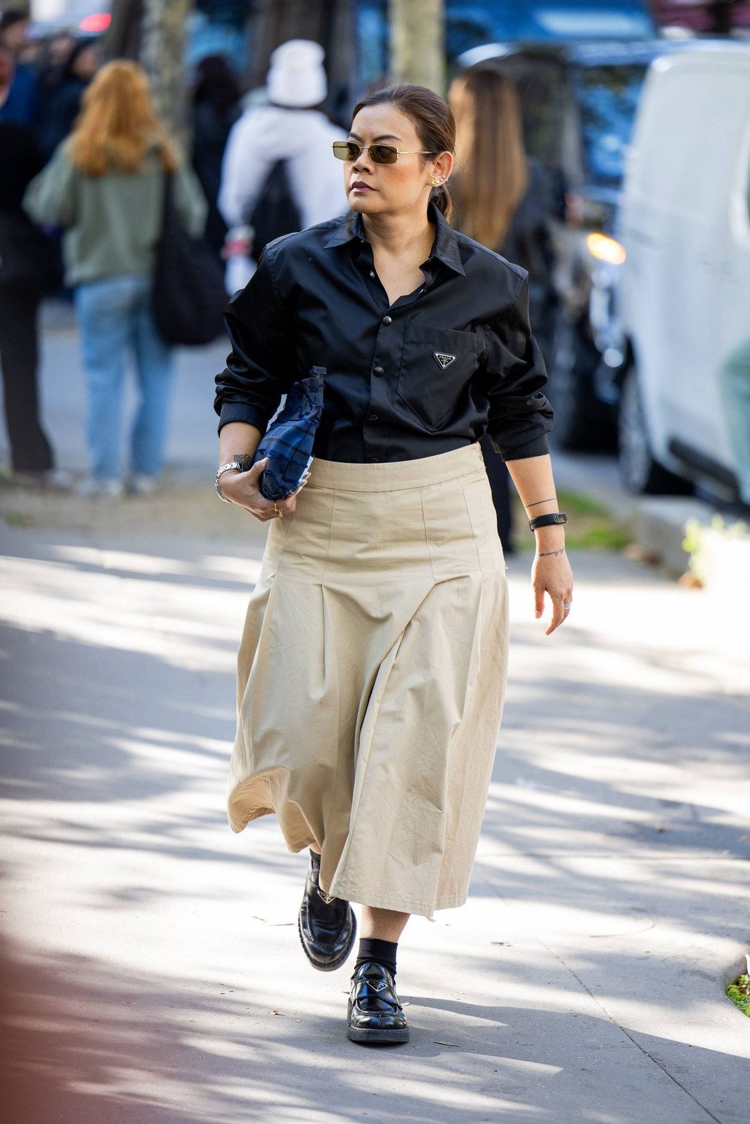 Monochromatic Ease: Black Loafers with Black Socks and a Beige Midi Skirt Monochromatic Ease: Black Loafers with Black Socks and a Beige Midi Skirt — Socks with Loafers Outfits