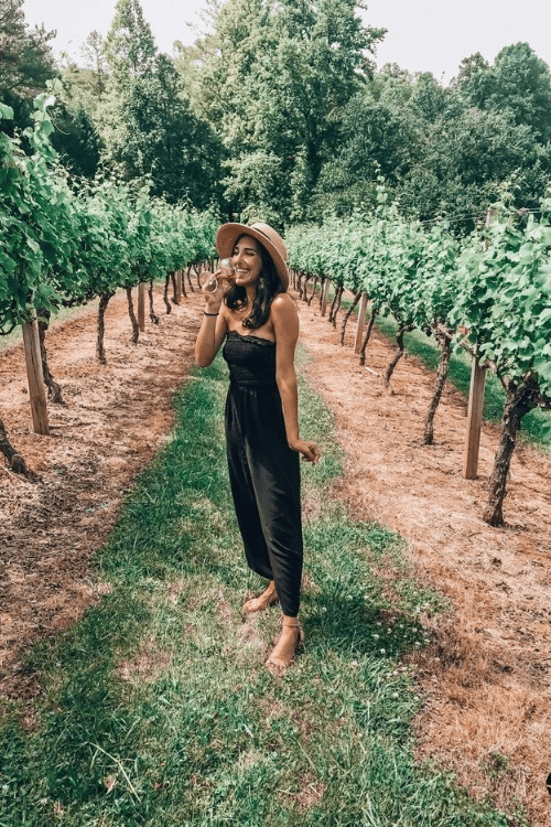 Strapless Wide-Leg Jumpsuit with a Fedora Hat for a Chic Winery Look — Winery Outfits