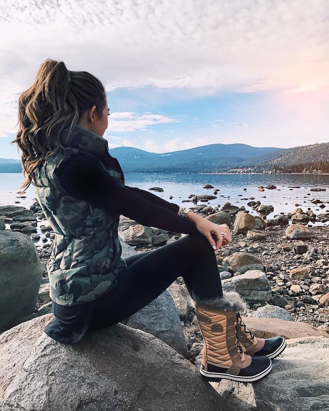 Camouflage Vest and Snow Boots for a Winter Lakeside Scene — Lake Tahoe Outfits