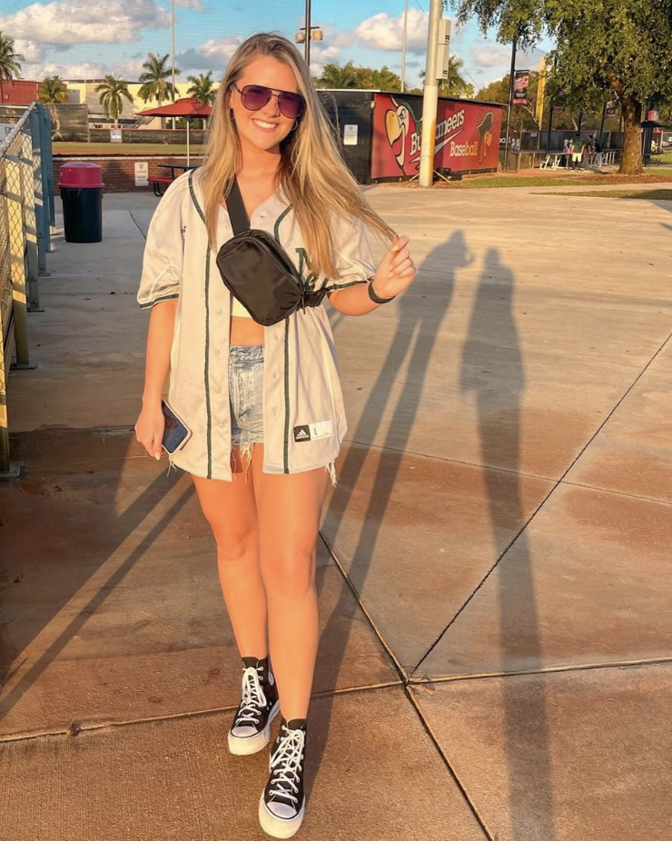 Oversized Baseball Jersey with Denim Shorts and Fanny Pack — Baseball Game Outfits