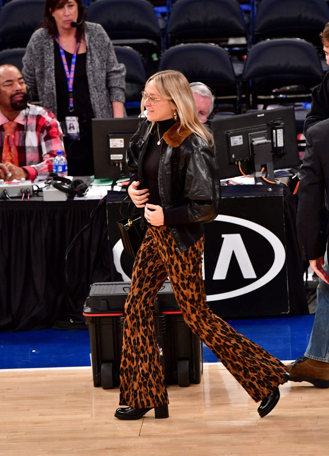 Leather Jacket and Flared Pants for an Edgy Game Look — Basketball Game Outfits