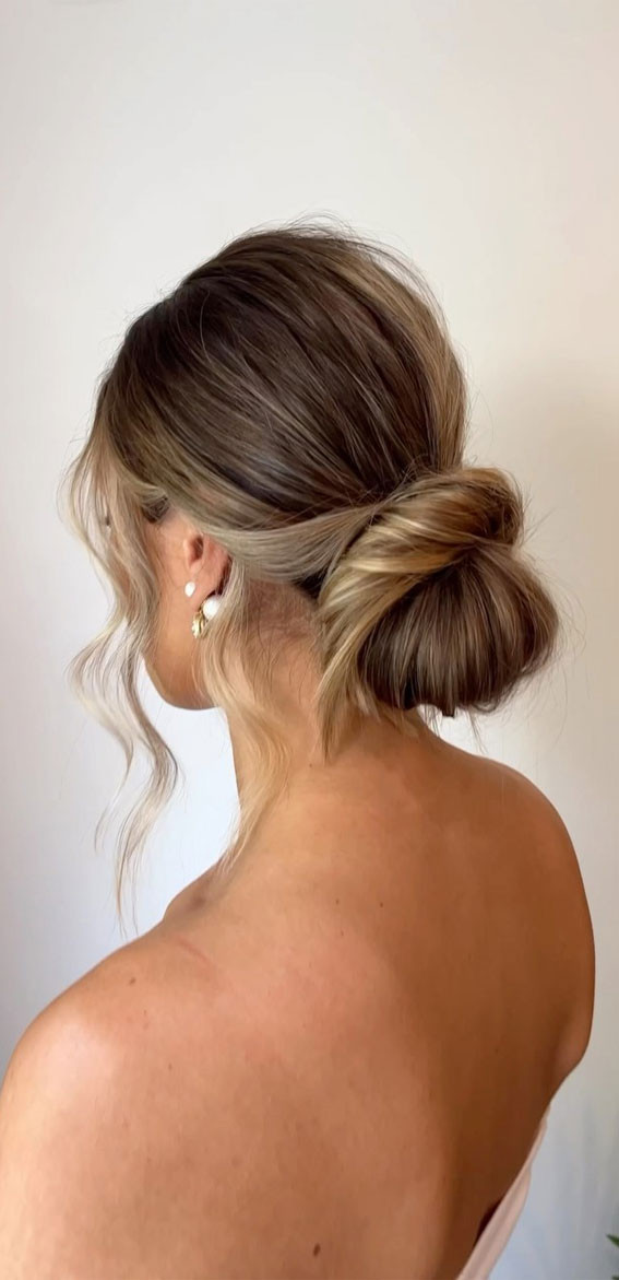 Blonde Textured Low Bun with Face-Framing — Low Bun with Bangs