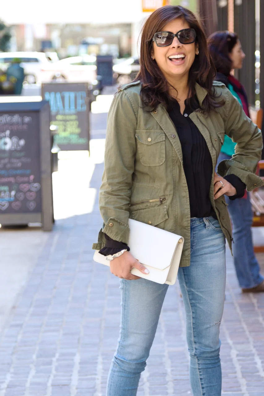 Utility Jacket and Jeans with a Crisp White Envelope Clutch — Clutch Outfits