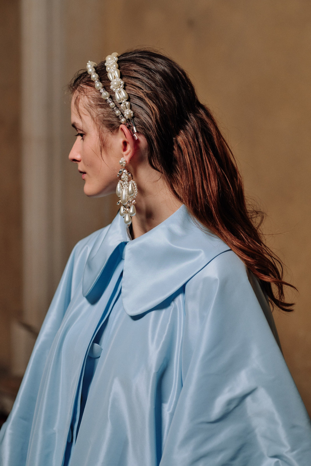 Dramatic Oversized Pearls with a Light Blue Satin Cape Dramatic Oversized Pearls with a Light Blue Satin Cape — Pearl Earrings Outfits