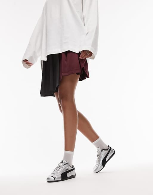 Edgy Contrast: Mini Skirt, White Top, and Metallic Speedcats Edgy Contrast: Mini Skirt, White Top, and Metallic Speedcats — Puma Speedcat Outfits