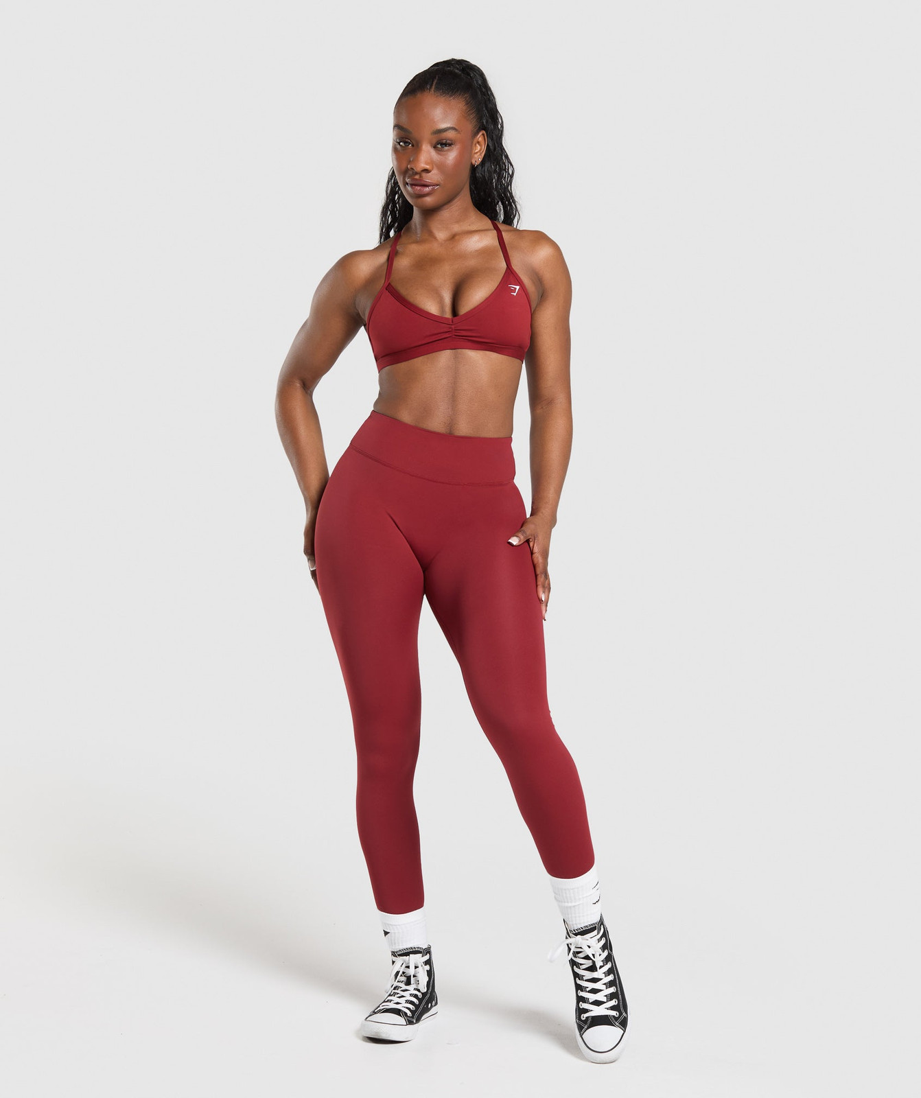 Bold Red Sports Bra and Leggings with High-Top Sneakers — Gymshark Outfits