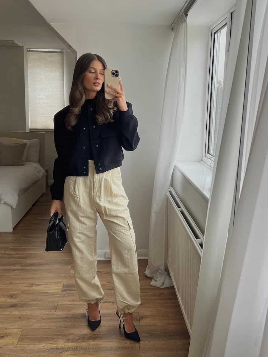 Cream Cargo Pants With Black Cropped Jacket and Heels — Cargo Pants Outfits