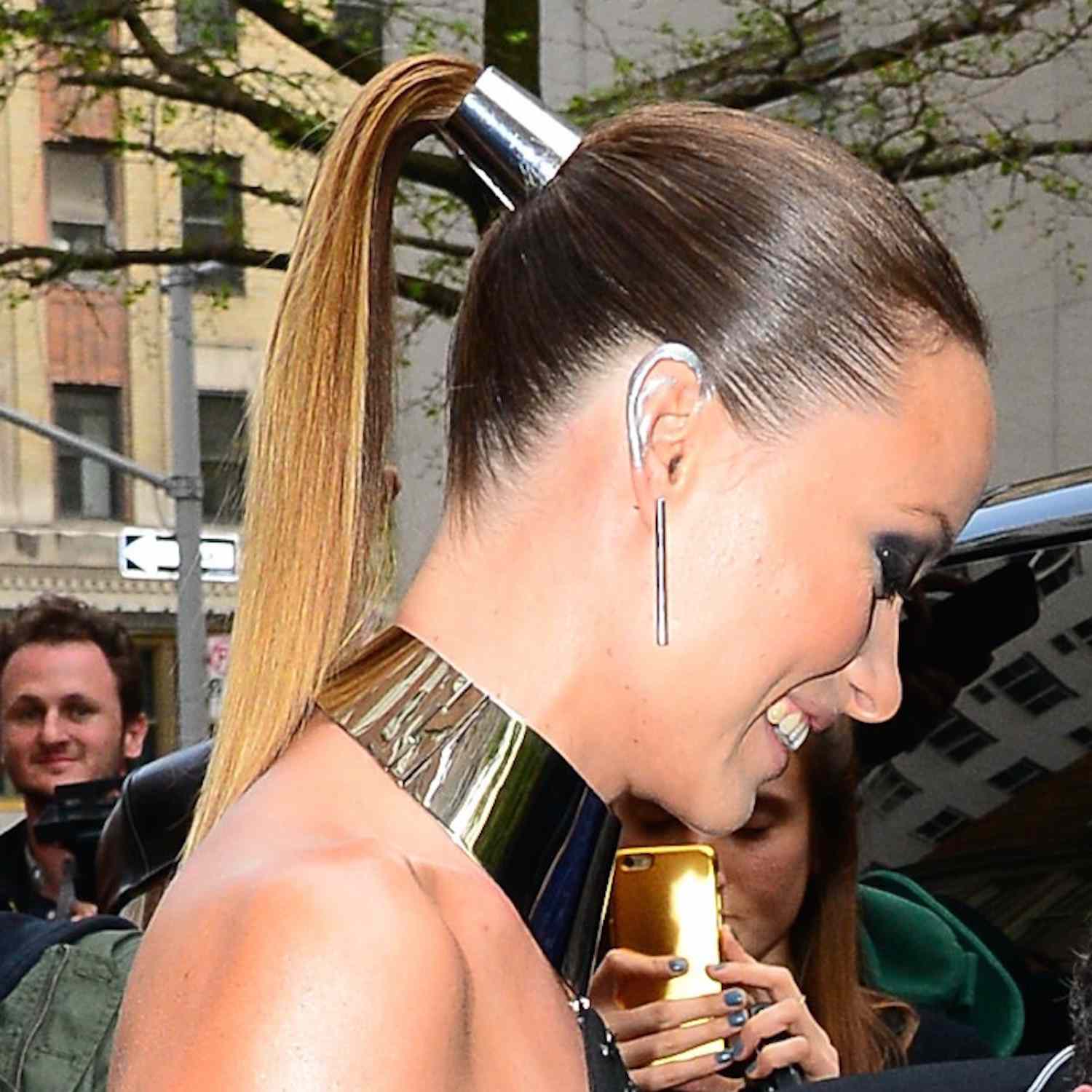 Blonde Ponytail With Metallic Accessory Blonde Ponytail With Metallic Accessory — Sleek Ponytail