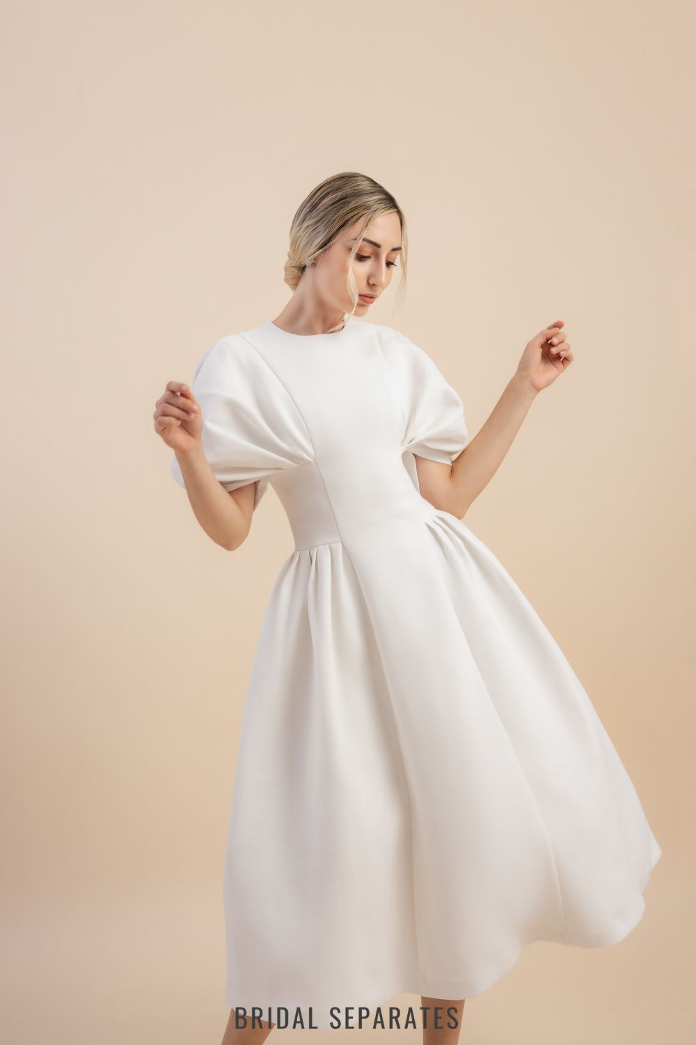 White Dress with Dramatic Puff Sleeves and Structured Skirt — Rehearsal Dinner Dresses