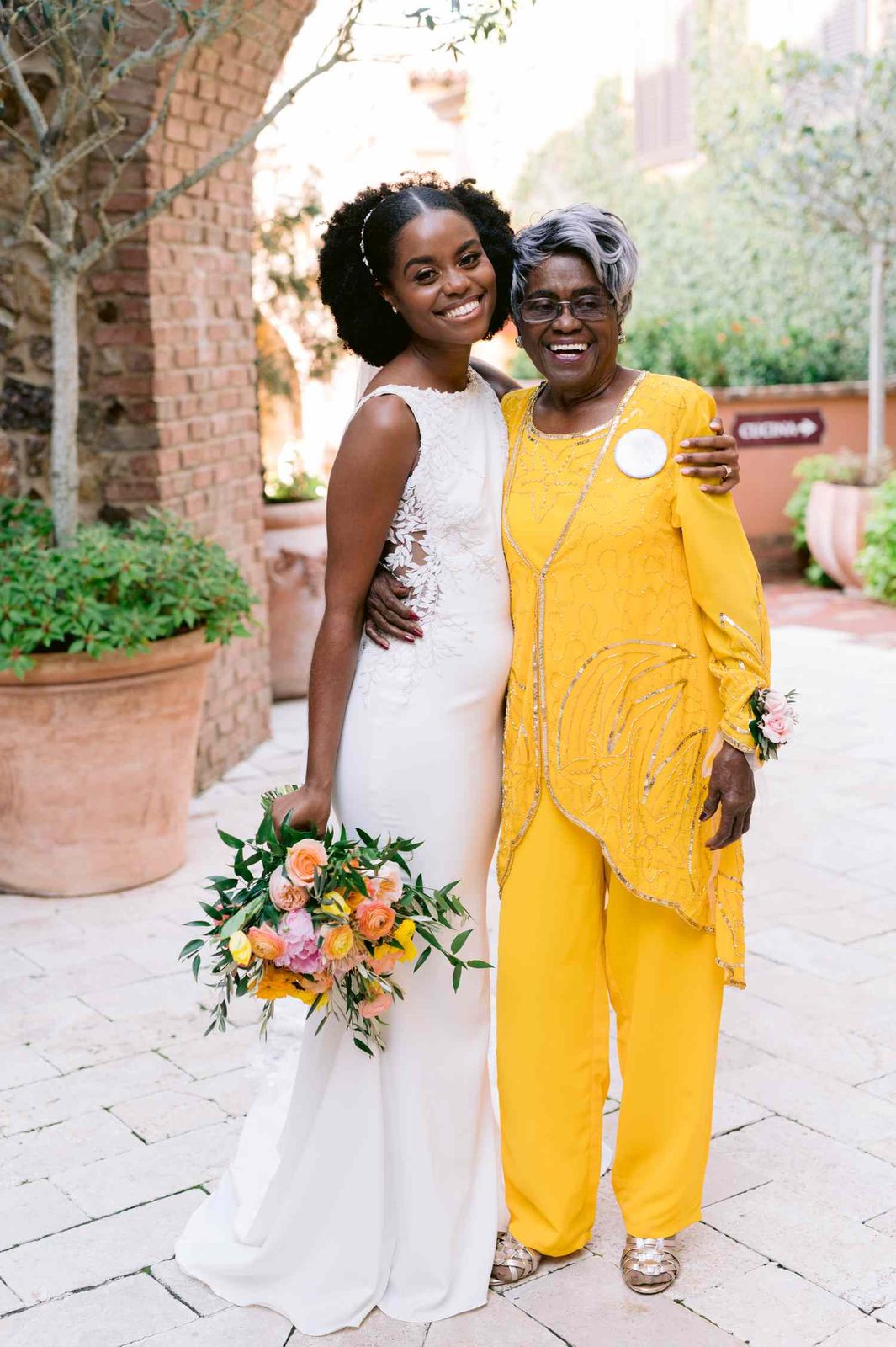 Vibrant Yellow Beaded Pantsuit with Intricate Embroidery — Grandmother of the Bride Outfits