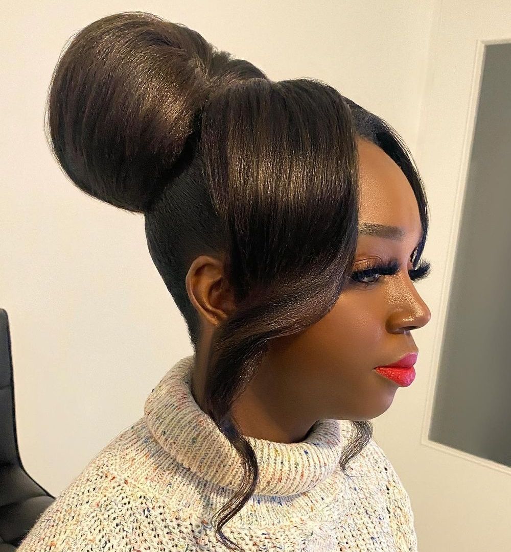 High Bun With Voluminous Curls High Bun With Voluminous Curls — Wedding Hairstyles for Black Women