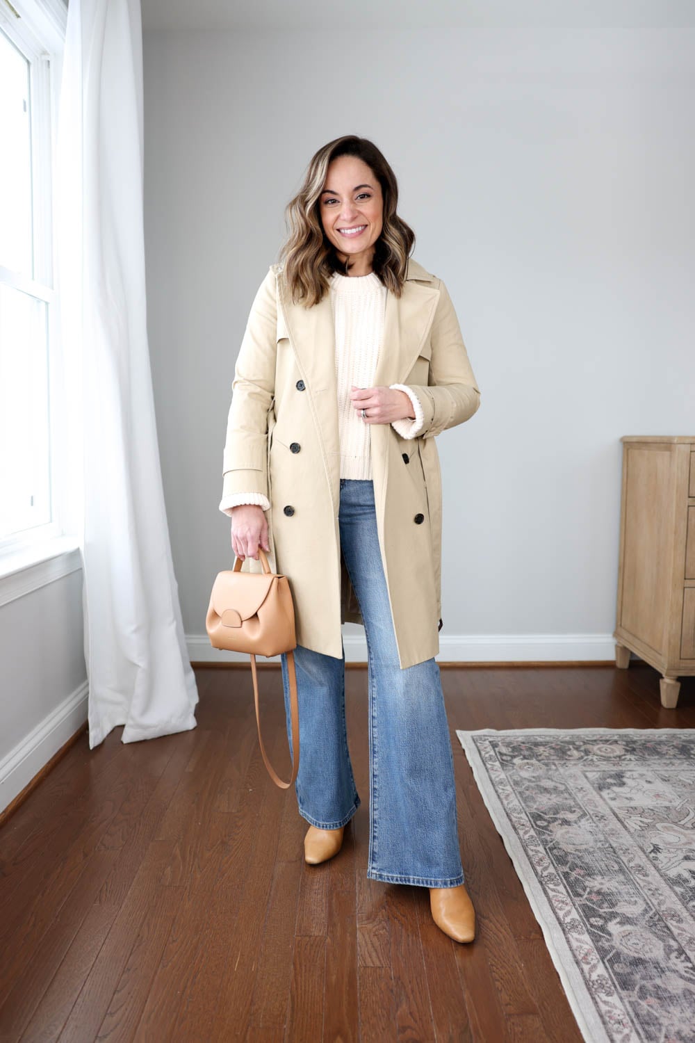 Cozy Knitwear and Trench Coat Over Light Flares — Flare Jeans