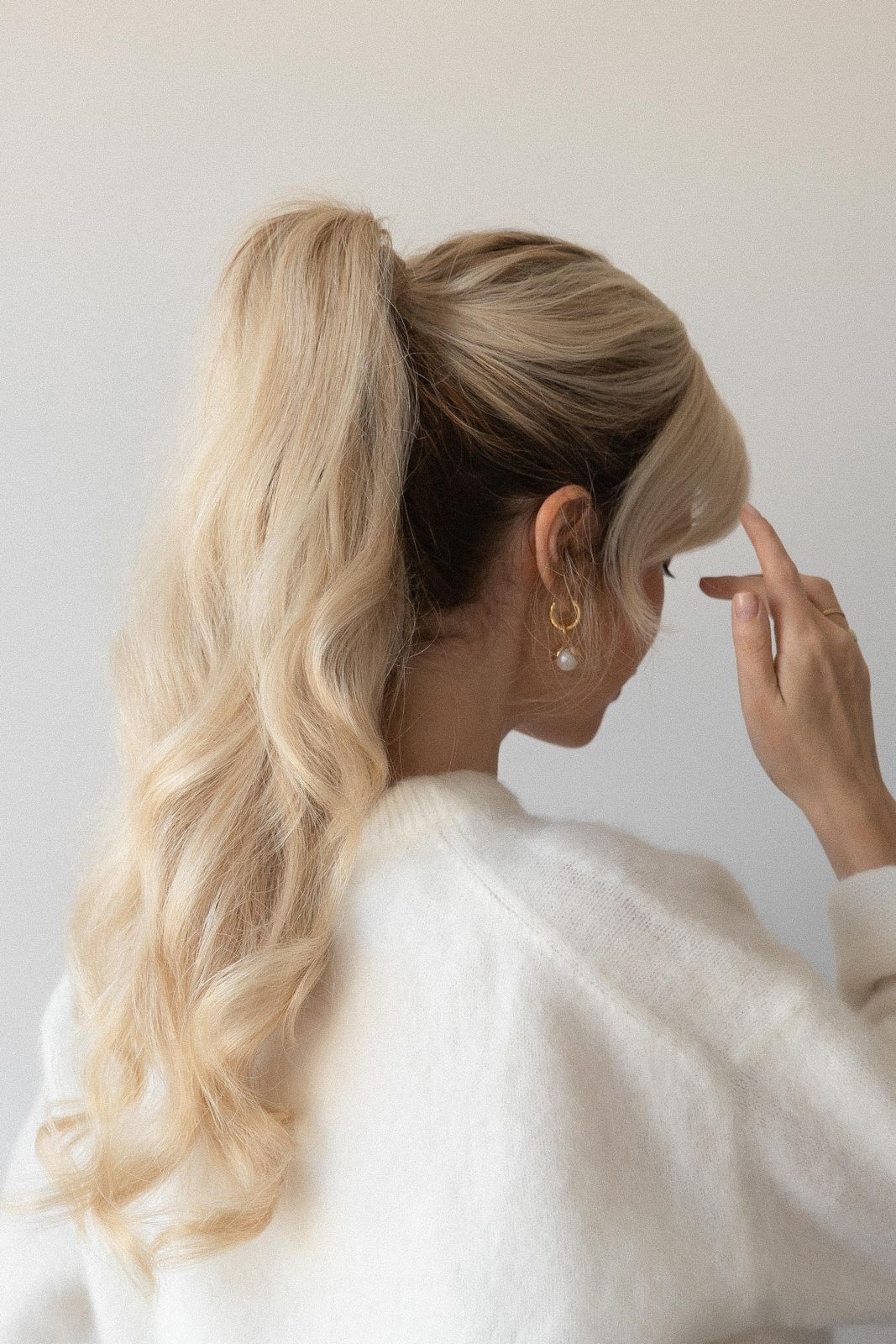Voluminous Ash Blonde High Ponytail — Ponytail with Bangs
