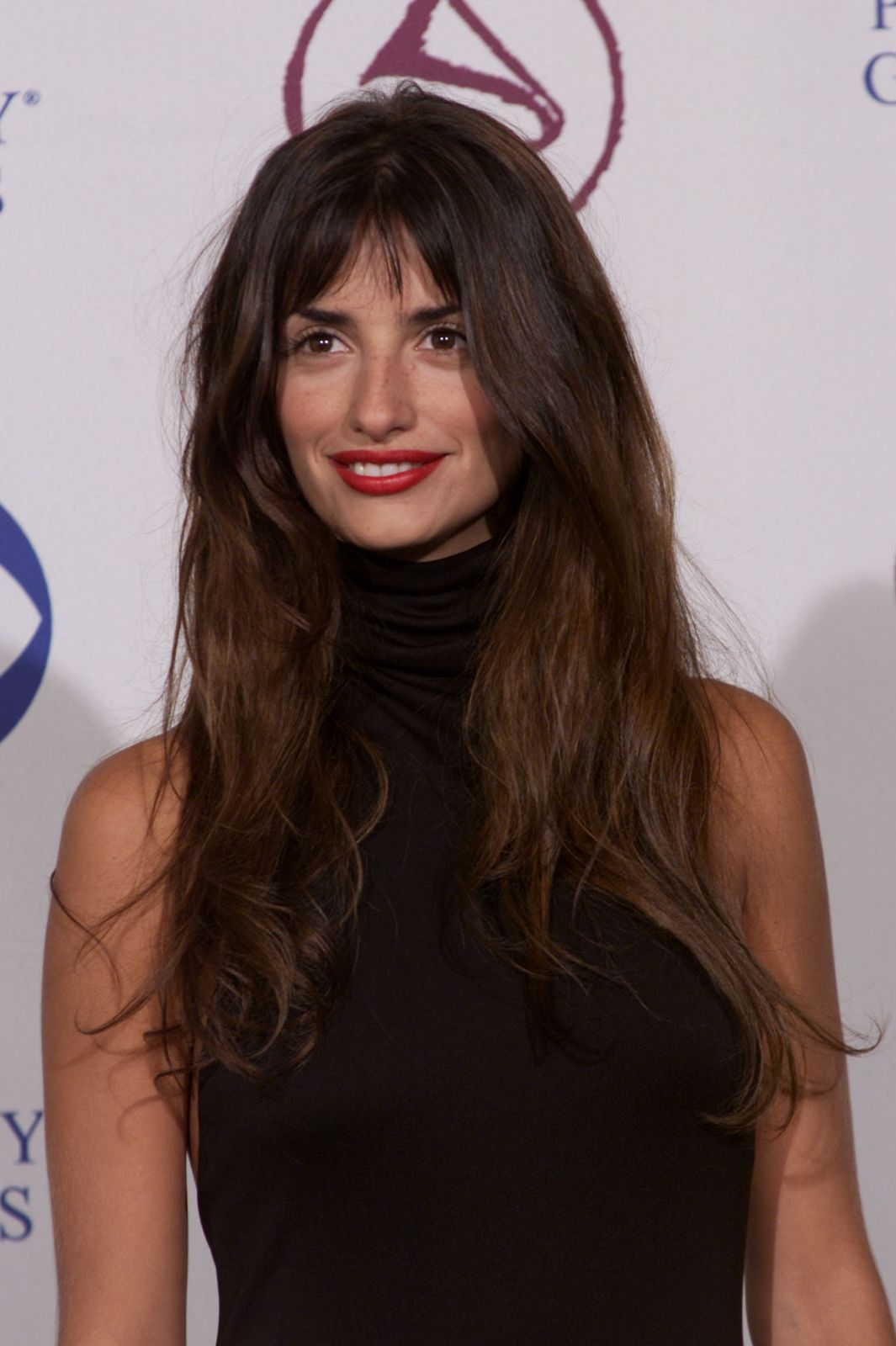 Dark Brown With Soft Curtain Bangs — Hair Color for Latinas