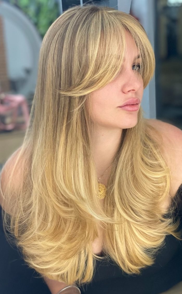 Golden Butter Blonde with Sculpted Layers — Long Layered Hair with Curtain Bangs