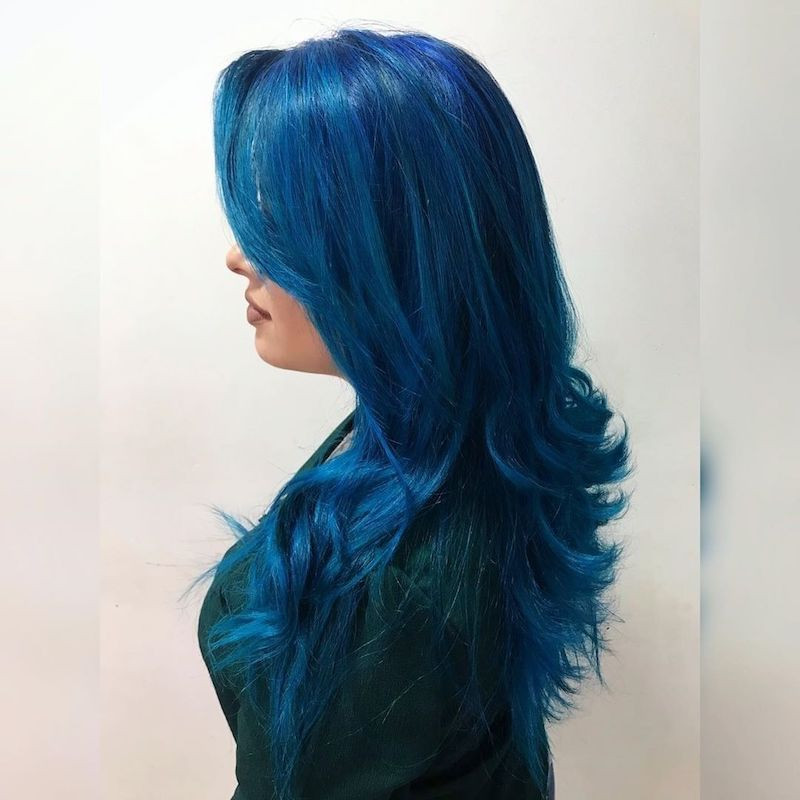 Mid-Back Waves With Side-Swept Bangs — Dark Blue Hair