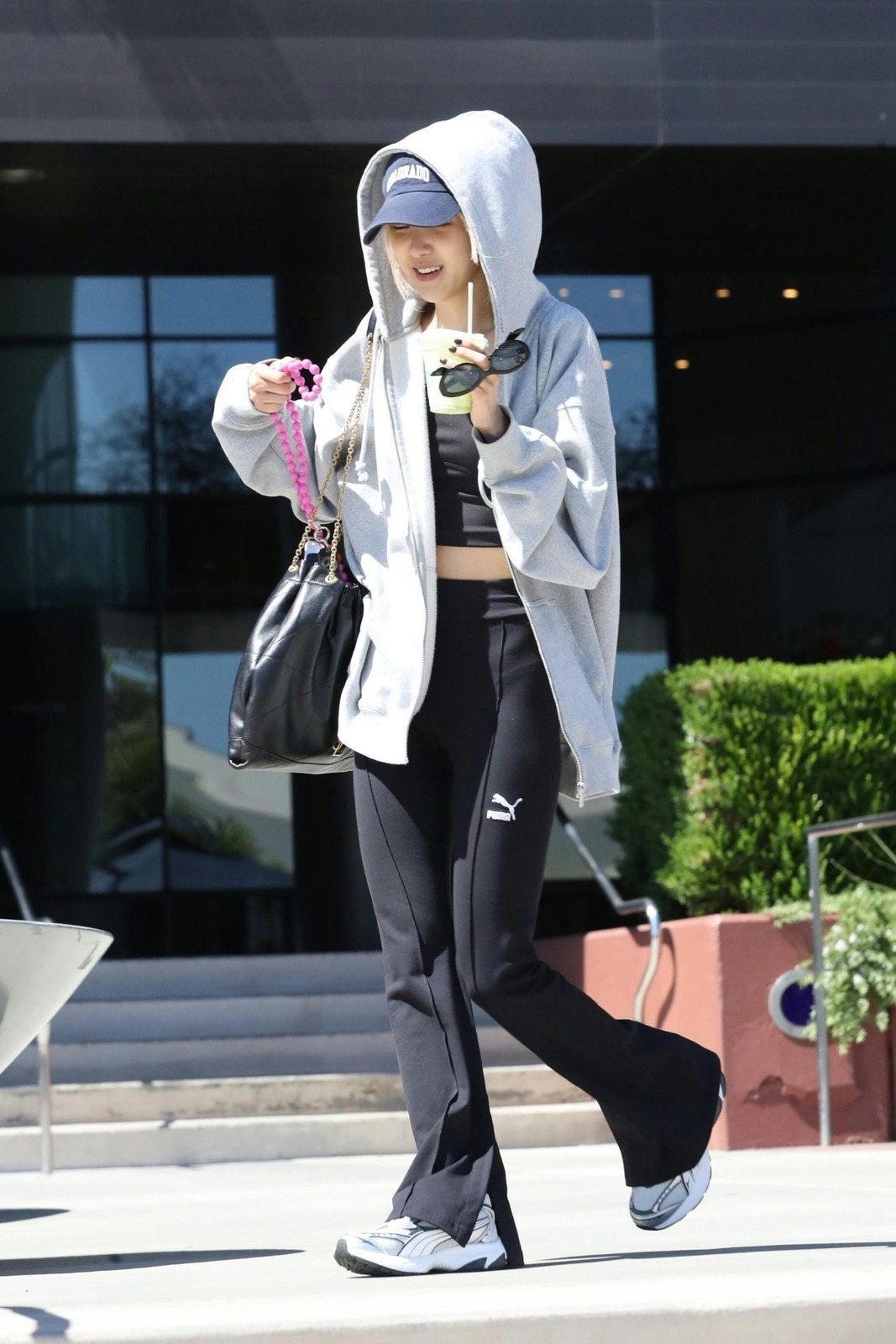 Oversized Hoodie Over a Crop Top with Flared Leggings Oversized Hoodie Over a Crop Top with Flared Leggings — Los Angeles Outfits