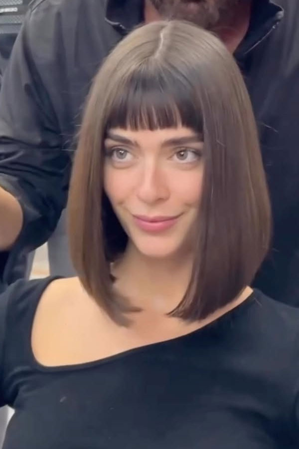 Asymmetric Neckline Top with Blunt Bob and Baby Bangs Asymmetric Neckline Top with Blunt Bob and Baby Bangs