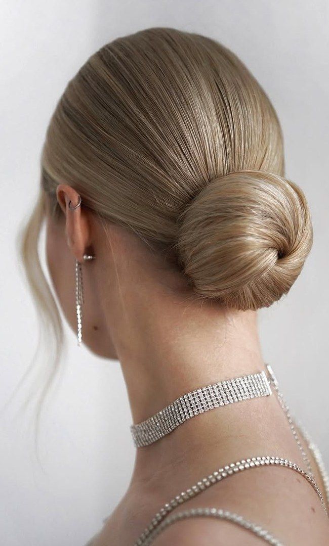 Neutral Blonde Smooth Rounded Bun — Sleek Low Bun