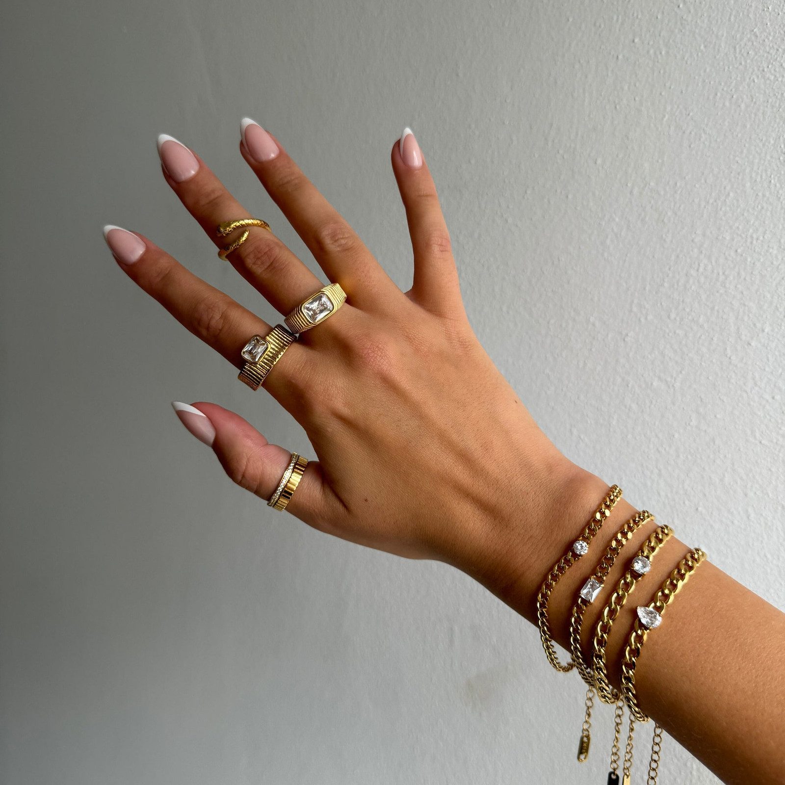 Stacked Gold Rings with Statement Bracelets Stacked Gold Rings with Statement Bracelets — Gold Ring Stack