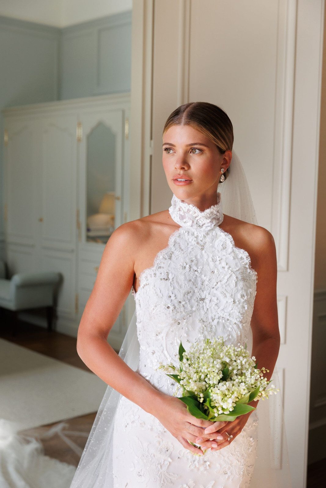 Sleek Low Ponytail with Middle Part Sleek Low Ponytail with Middle Part — Wedding Hairstyles with Veil