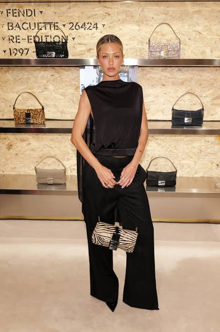 Sleek Evening: Zebra Print Baguette with Black Ensemble Sleek Evening: Zebra Print Baguette with Black Ensemble — Baguette Bag Outfits