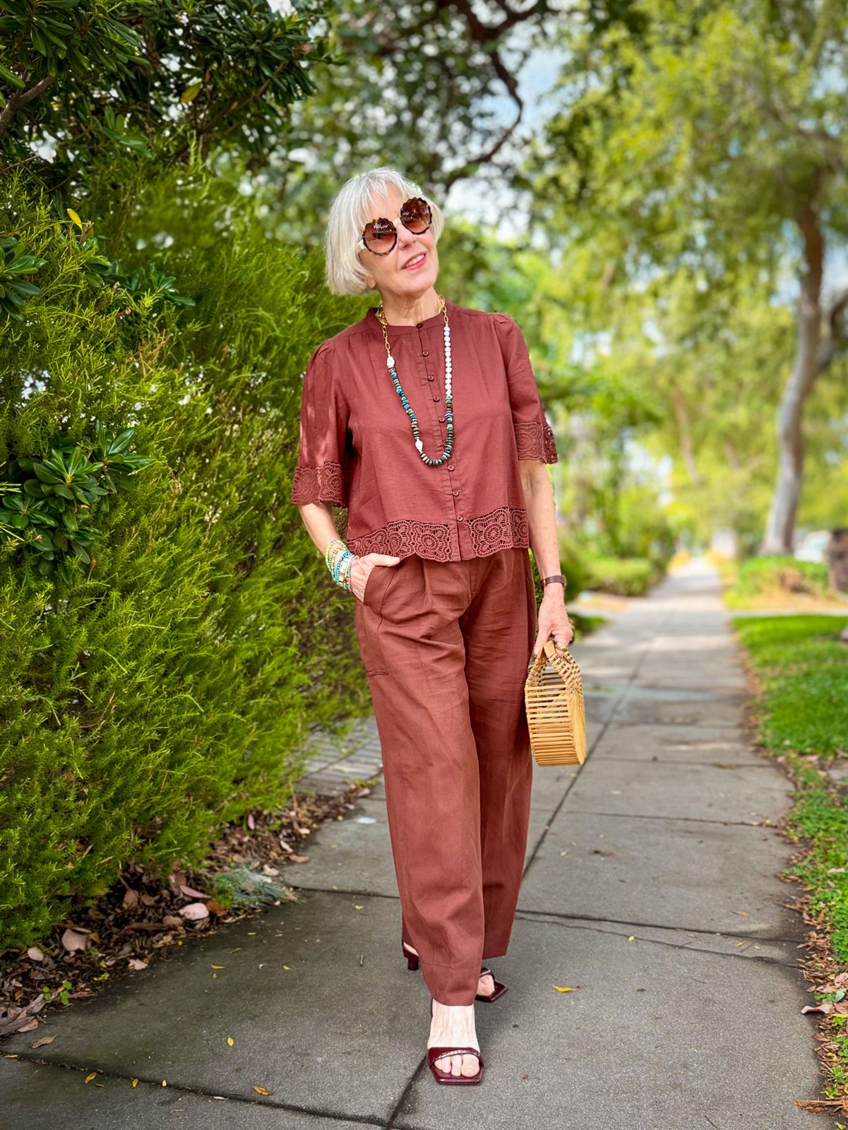 Resort Casual with Lace Top and Linen Trousers — Round Sunglasses Outfits