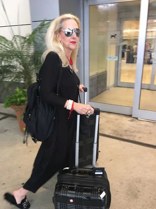 Black Wide-Leg Jumpsuit with Fur-Trimmed Slippers — Long Flight Outfits