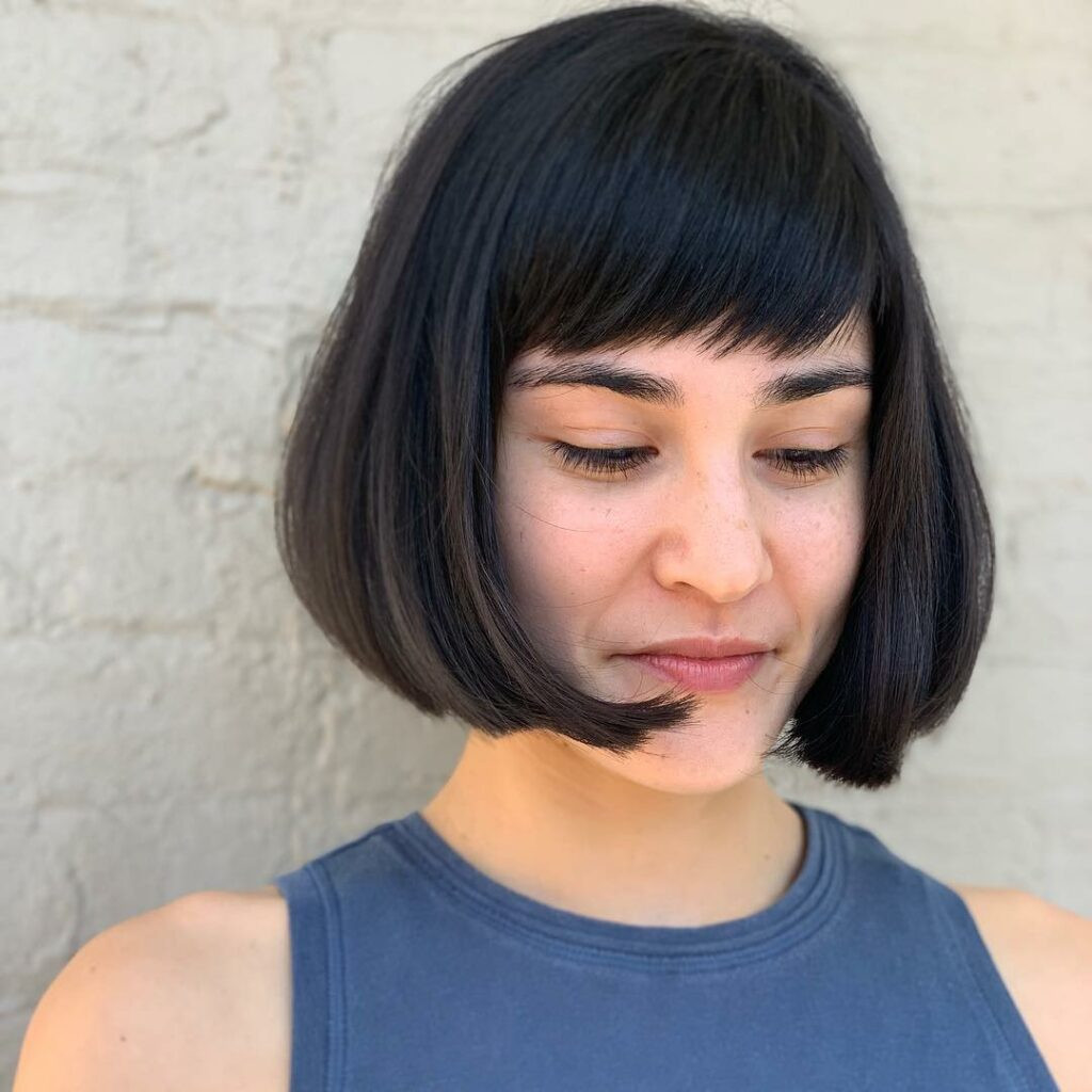 Sharp Chin-Length Bob With Blunt Bangs — Hairstyles for Growing Out a Bob