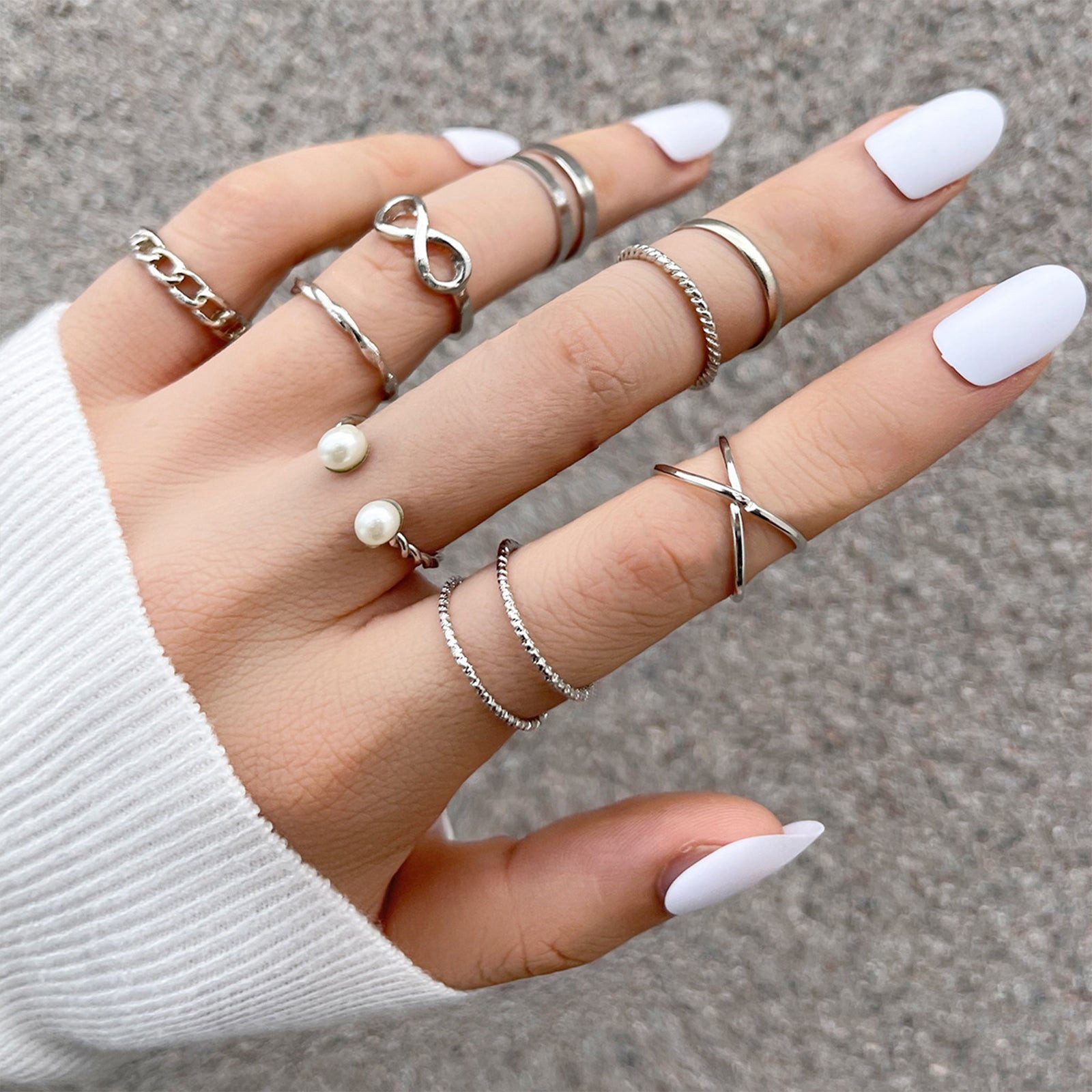 Textured Silver Rings with a Knit Sweater — Silver Ring Stack