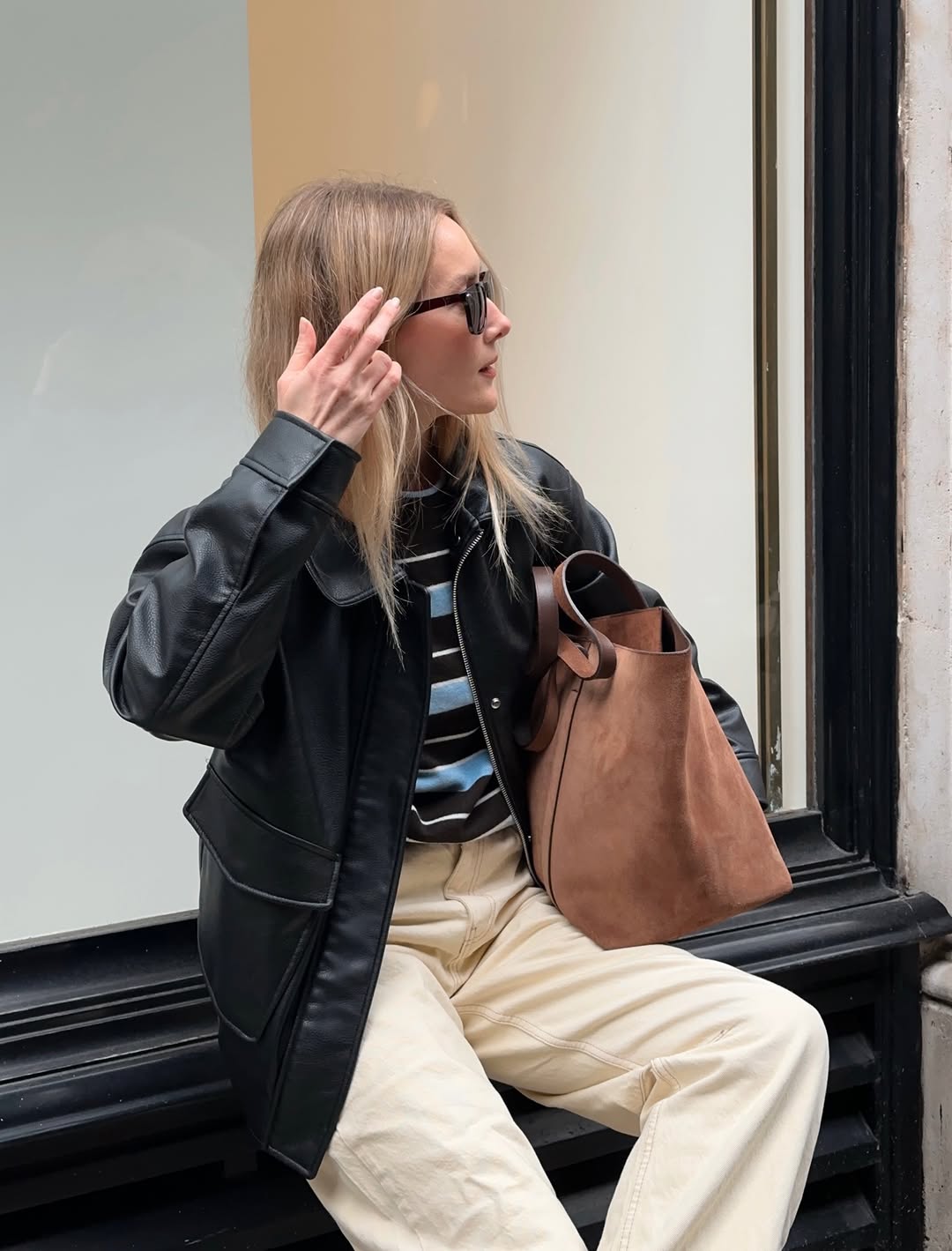 Edgy Meets Casual: Faux Leather Jacket and Cream Trousers — It Girl Outfits
