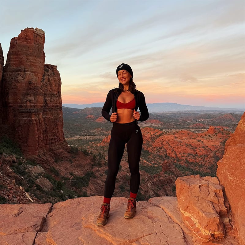 Red Sports Bra and Black Leggings with Hiking Boots — Outfits for Athletic Build