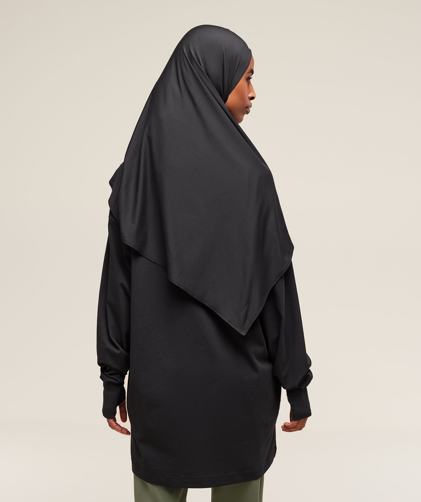 Monochromatic Black Top with Green Pants — Hijab Work Outfits