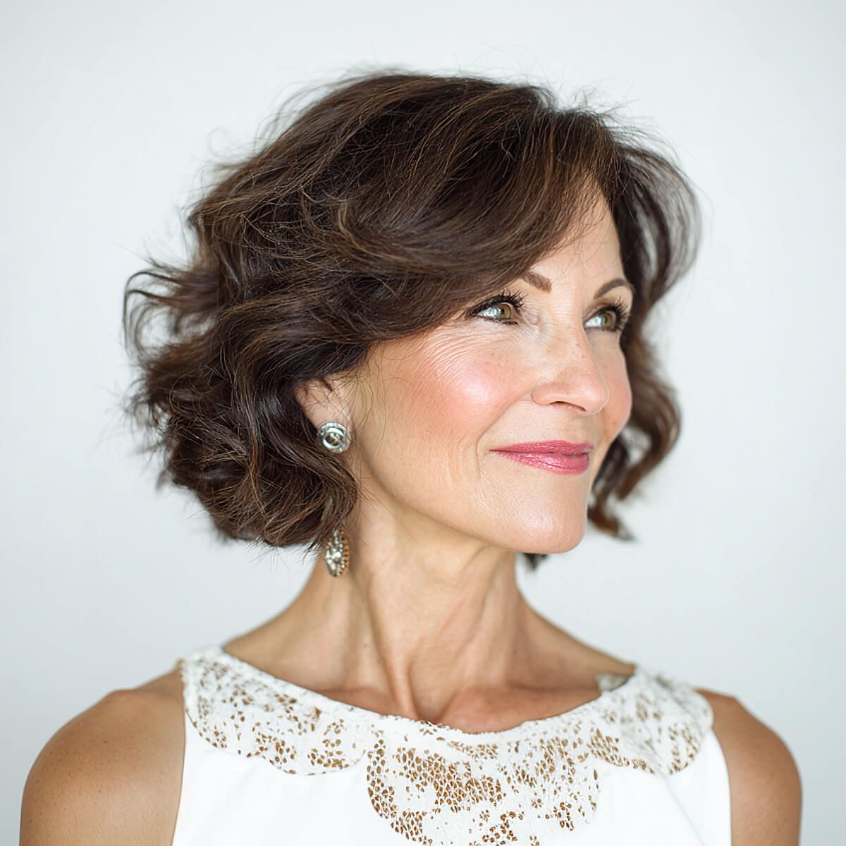 Ear Length Layered Bob Blowout — Haircuts for Wavy Hair