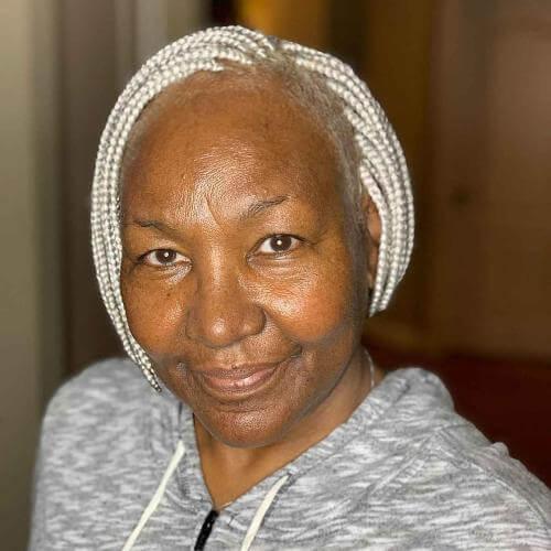 Shoulder Length Dark Brown Curls With Highlights — Haircuts for Black Women Over 60