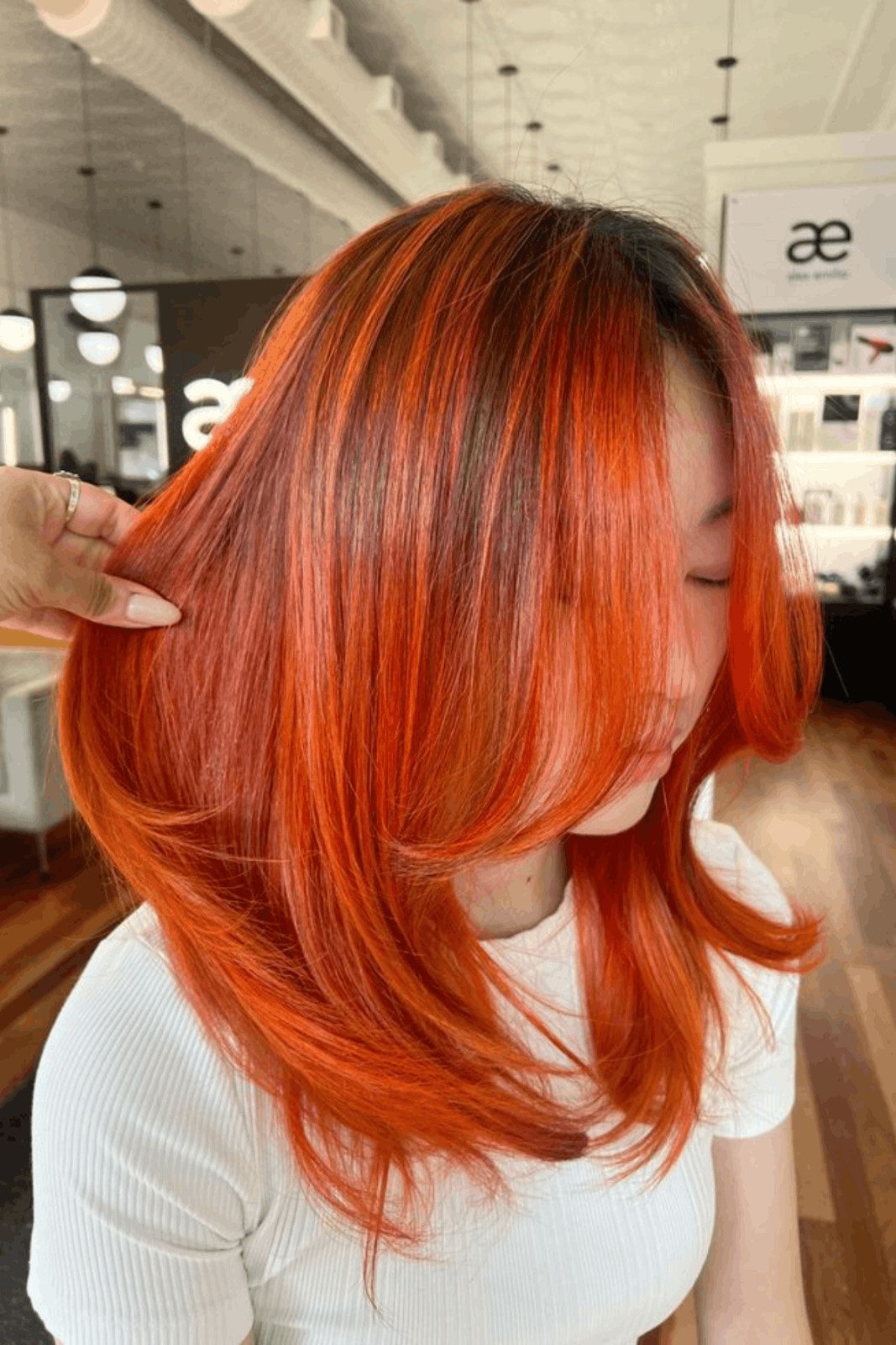 Layered Orange With Face-Framing Bangs — Sunset Hair