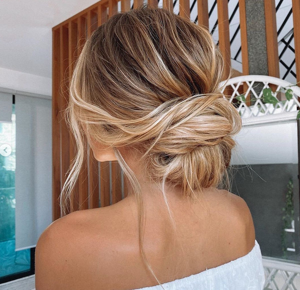 Honey Blonde Messy Low Bun With Face-Framing Pieces — Halo Extensions Hairstyles